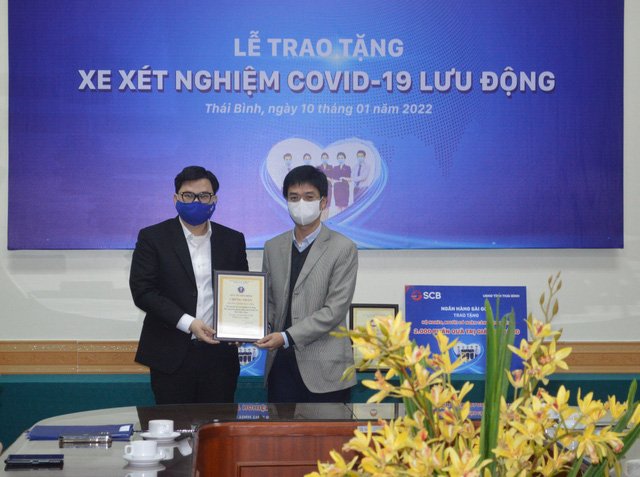 SCB trao tặng xe xét nghiệm lưu động tại tỉnh Thái Bình và Thanh Hóa - Ảnh 2.